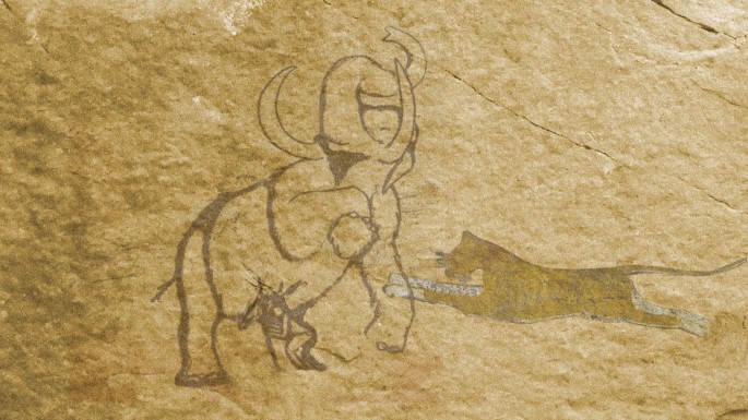 A photograph of a rock art in which a person spears an elephant from below. There is a lion's painting superimposed beside.