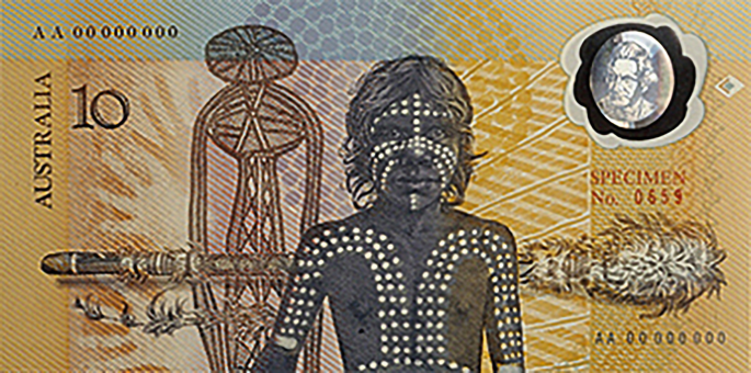 A photograph of a ten dollar currency note of Australia showcasing rock art motifs and the Morning star pole.