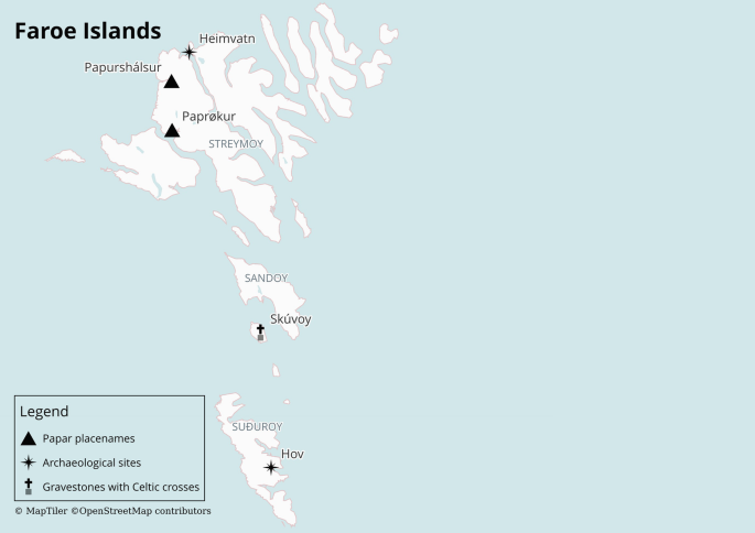 A map of the Faroe Islands. It has 2 Papar place names, Papurshalsur and Paprokur in the north, 2 archaeological sites, Heimvath in the north and Hov in the south, and a gravestone with Celtic crosses in a small island at the center to the east of Skuvey.