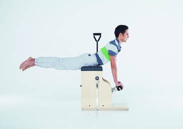 Feet In Straps on the Reformer  Pseudo-Closed Chain Exercise 