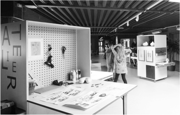 A photograph represents the two transformable cabinets designed in innovative processes, one is a mobile design, and another is a tool for presentation.