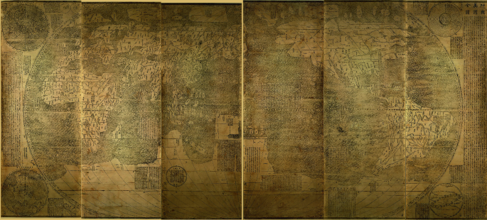 A photograph of an old World map.