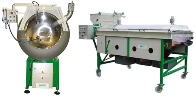 Two machines of a pelletizer and a pellet sorter. One has a large drum, and the other has a table-like device on wheels.