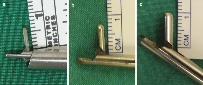 3 photographs of endoscopic forceps exhibit the size of the actuating jaw of the endoscopic forceps. A and B consist of photographs of the endoscopic jaws with a ideal lengths of 7 to 8 millimeters. C. A photograph of the endoscopic jaw of length 10 millimeters, which not recommended.