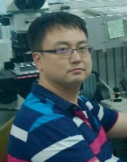 A photograph of Doctor Jian Yi.