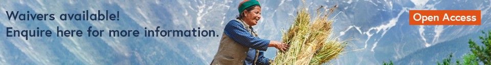 Female farmer harvesting wheat