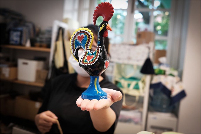 Meet the artist behind the big blue rooster
