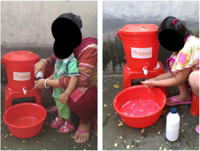 Hand-washing station [includes bucket with tap, bowl, and soapy water