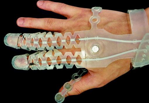 design improvement of a polymer based tendon driven wearable robotic