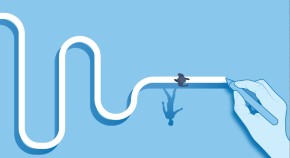 Overhead view of large hand drawing a path with silhouette of a person walking on it