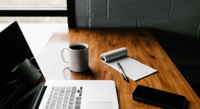 Laptop, coffee and notepad