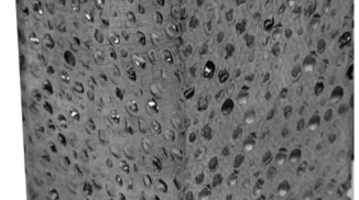 Performance of composite metal foams under cyclic loading at elevated temperatures