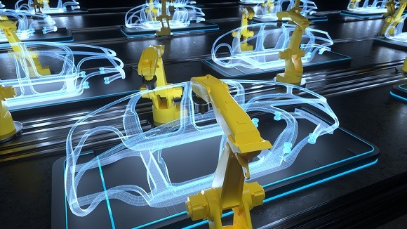  yellow colored robotic arms working on car production line