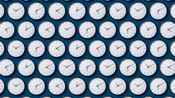 Neatly Arranged Timezone Clocks on Solid Blue Colored Background