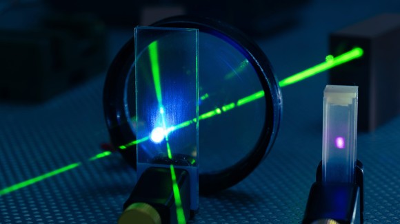 Laser experiment in photonics laboratory.