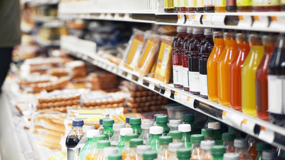 Refrigerated foods on shop shelves.