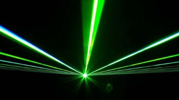 Green lasers on black background