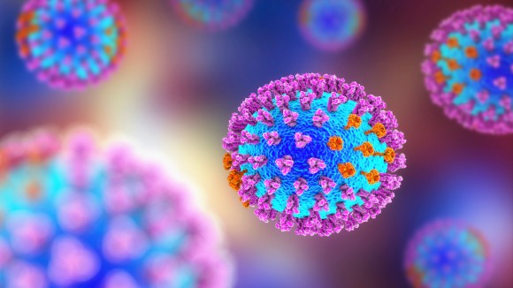 Influenza virus. 3D illustration showing surface glycoprotein spikes hemagglutinin purple and neuraminidase orange.