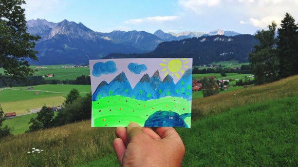 Painting of landscape, with landscape itself in the background