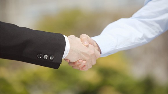 close up of handshake between business partners