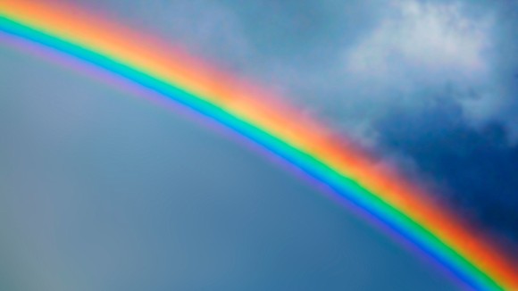 Rainbow in stormy sky