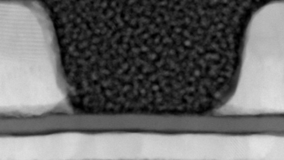 Figure Caption: a cross-sectional electron microscopy image of a monolayer WSe2 transistor with a channel length of 55 nm.