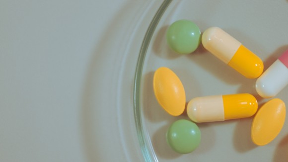 Colorful pills on table