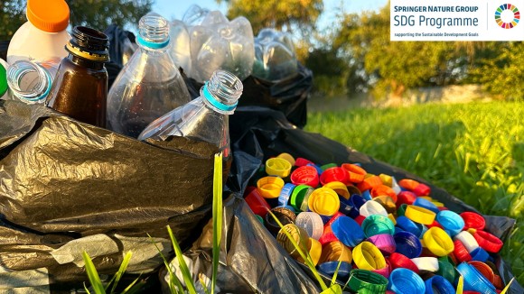 Plastic collecting for recycling. Plastic caps and Lids plastic bottles in garbage bag for recycling.