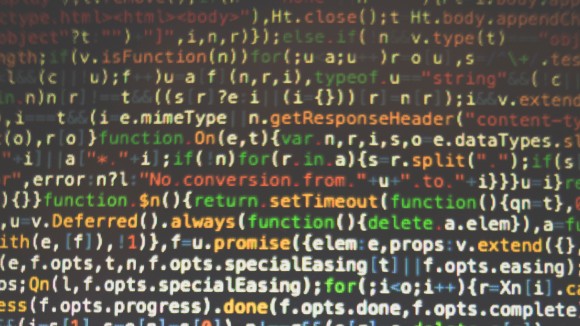 big data research in health Program source code on monitor screen.