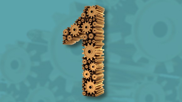 The number 1 made from slotted 3-dimensional bronze cogs