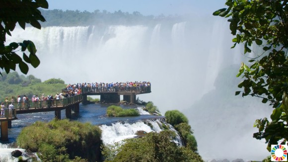 Tourists overcrowding at a remote waterfall.