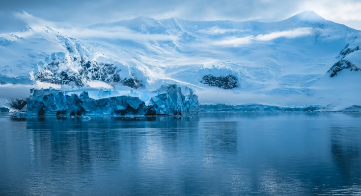 Antarctic glacier edge and iceberg