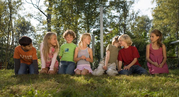Kids playing telephone game