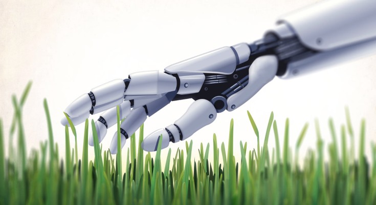 Robotic hand touching grass