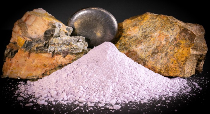 two rocks containing rare earth metals, a piece of polished rare earth metal, and rare earth metals in powder form