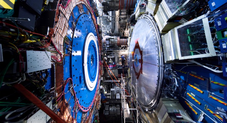 Part of the Large Hadron Collider’s ATLAS detector - two giant metal discs face each over, covered with wires