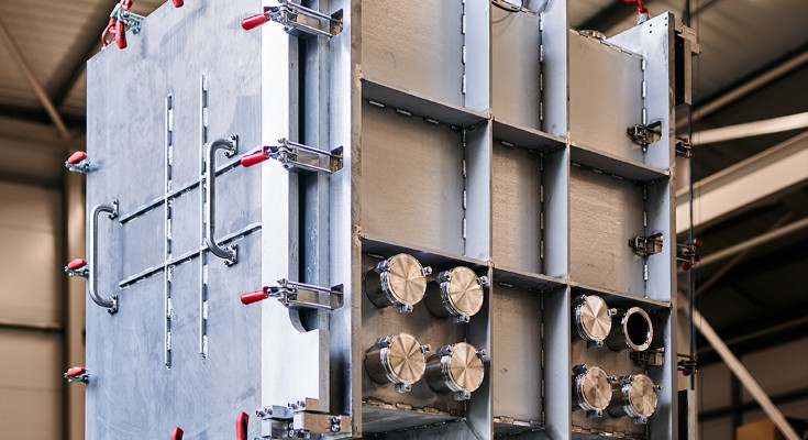 PsiCube, PsiQuantum's prototype cryogenic cabinet which is installed at PsiQuantum's facilities in Daresbury, UK and is the intermediate system upon which PsiQuantum's recent silicon photonic results were yielded from.