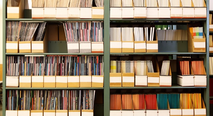 A general view of a library shelf containing stacks of journals