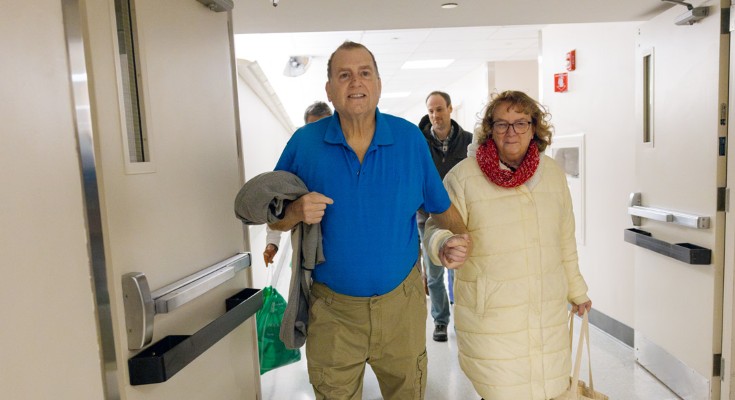 Tim Andrews and his wife, Karen, smile as they leave Massachusetts General Hospital on Saturday, February 1, 2025