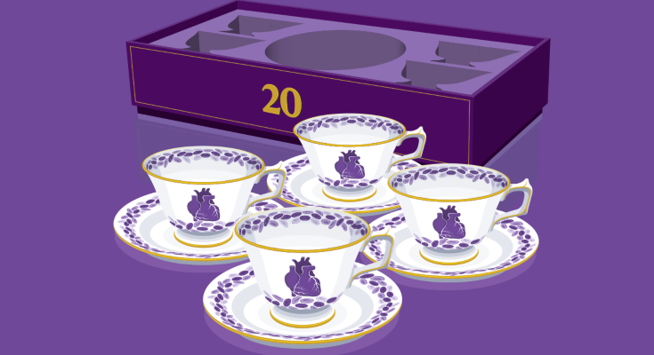 Four tea cups with purple hearts on them